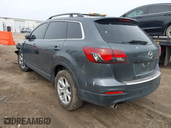 2015 Mazda CX-9 Touring with VIN JM3TB2CA0F0463313, listed as a IAAI auction lot 41822436 with 145,302 mi miles. Bid and sale history available at carsss.com. Image 3.