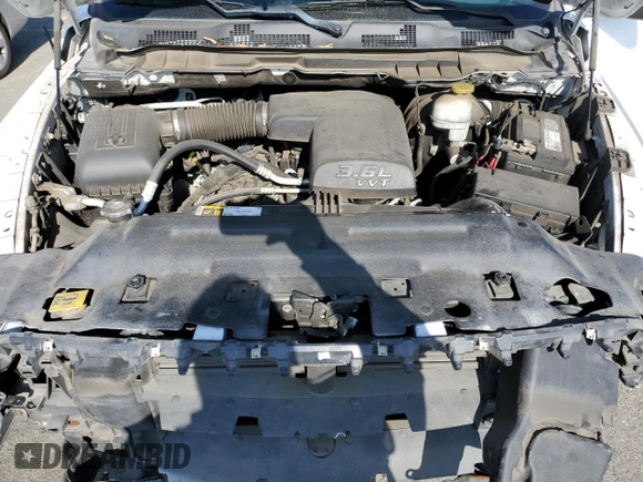 2018 Ram 1500 SLT z VIN 1C6RR6GG1JS317639, wystawiony jako Copart lot #83449814 z przebiegiem 103 022 mil mil oraz Szkoda całkowita • Salvage title. Historia ofert i sprzedaży dostępna na DreamBid. Obrazek 11.