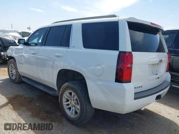 2015 Chevrolet Tahoe LS with VIN 1GNSCAKC3FR687421, listed as a IAAI auction lot 41930895 with Not provided miles and . Bid and sale history available at DreamBid. Image 3.