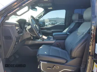 2023 Ford F-150 Lightning Pro with VIN 1FTVW1EV1PWG17333, listed as a Copart auction lot 57904025 with 21,173 mi miles and Salvage title. Bid and sale history available at DreamBid. Image 7.