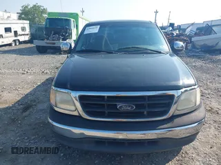 2000 Ford F-150 XL z VIN 1FTZF1723YNA11897, wystawiony jako IAAI lot #42806638 z przebiegiem Nie podano mil oraz . Historia ofert i sprzedaży dostępna na DreamBid. Obrazek 6.