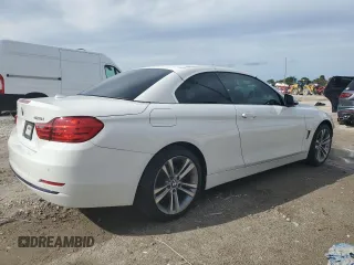 2016 BMW 4 Series 428i xDrive with VIN WBA3T1C52GP822072, listed as a Copart auction lot 87244184 with 80,946 mi miles and Salvage title. Bid and sale history available at DreamBid. Image 3.