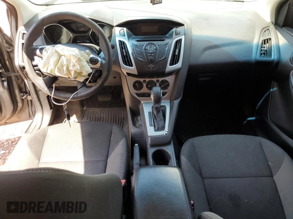 2012 Ford Focus SE z VIN 1FAHP3K24CL338153, wystawiony jako Copart lot #56161925 z przebiegiem 167 146 mil mil oraz Szkoda całkowita • Salvage title. Historia ofert i sprzedaży dostępna na DreamBid. Obrazek 8.