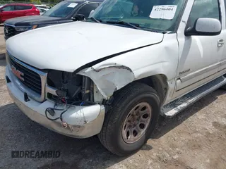 2003 GMC Yukon SLT z VIN 1GKEC13V43R278155, wystawiony jako IAAI lot #42296404 z przebiegiem 333 477 mil mil oraz . Historia ofert i sprzedaży dostępna na DreamBid. Obrazek 6.
