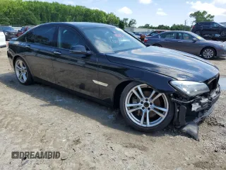 2015 BMW 7 Series 740i z VIN WBAYA6C59FD826788, wystawiony jako Copart lot #55747215 z przebiegiem 134 960 mil mil oraz Szkoda całkowita • Salvage title. Historia ofert i sprzedaży dostępna na DreamBid. Obrazek 4.