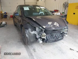 2023 Tesla Model 3 z VIN 5YJ3E1EA7PF548126, wystawiony jako IAAI lot #41585930 z przebiegiem 10 652 mil mil oraz . Historia ofert i sprzedaży dostępna na DreamBid. Obrazek 1.