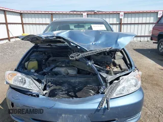 2004 Toyota Camry LE z VIN JTDBE32K140260522, wystawiony jako IAAI lot #42476400 z przebiegiem 152 466 mil mil oraz . Historia ofert i sprzedaży dostępna na DreamBid. Obrazek 6.