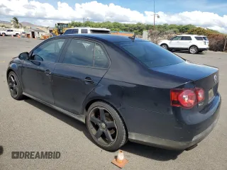 2009 Volkswagen Jetta GLI z VIN 3VWBJ71K19M071374, wystawiony jako Copart lot #77714284 z przebiegiem 61 434 mil mil oraz Szkoda całkowita • Salvage title. Historia ofert i sprzedaży dostępna na DreamBid. Obrazek 2.