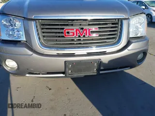 2005 GMC Envoy SLT with VIN 1GKDT13S152373799, listed as a IAAI auction lot 41537512 with 187,750 mi miles. Bid and sale history available at carsss.com. Image 6.