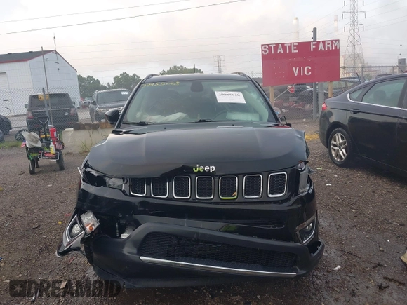 2018 Jeep Compass Limited with VIN 3C4NJDCB1JT354234, listed as a IAAI auction lot 39985028 with 76,293 mi miles. Bid and sale history available at carsss.com. Image 12.