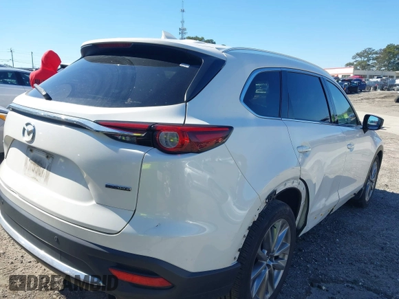 2020 Mazda CX-9 Grand Touring with VIN JM3TCADYXL0415090, listed as a IAAI auction lot 41599205 with 133,080 mi miles. Bid and sale history available at carsss.com. Image 4.