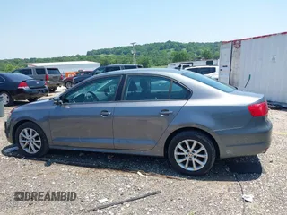 2011 Volkswagen Jetta SE with VIN 3VWDZ7AJ0BM012959, listed as a IAAI auction lot 42455475 with 128,220 mi miles and . Bid and sale history available at DreamBid. Image 14.