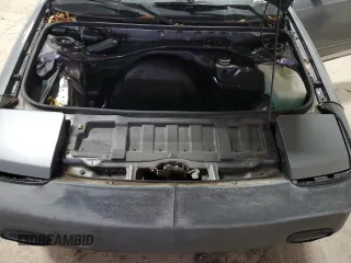 1989 Toyota MR2 z VIN JT2AW15C1K0150268, wystawiony jako Copart lot #86257134 z przebiegiem 93 969 mil mil oraz Tytuł czysty. Historia ofert i sprzedaży dostępna na DreamBid. Obrazek 11.