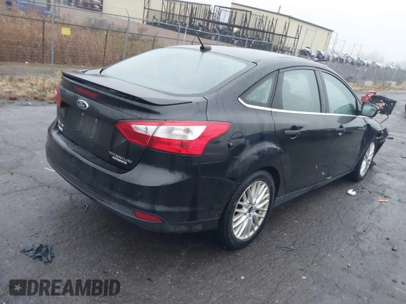 2014 Ford Focus Titanium with VIN 1FADP3J24EL439065, listed as a IAAI auction lot 40868973 with 167,739 mi miles. Bid and sale history available at carsss.com. Image 4.