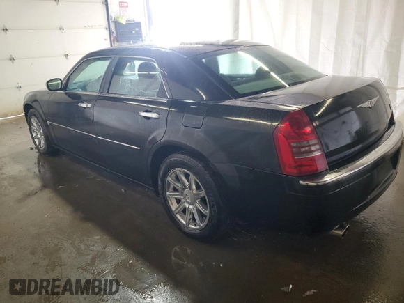 2005 Chrysler 300 with VIN 2C3JA63HX5H501958, listed as a Copart auction lot 52676825 with 119,395 mi miles and Salvage Title. Bid and sale history available at carsss.com. Image 2.