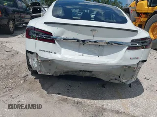 2017 Tesla Model S 100D with VIN 5YJSA1E45HF189006, listed as a IAAI auction lot 42540693 with 64,827 mi miles and . Bid and sale history available at DreamBid. Image 6.
