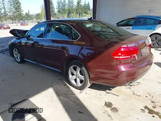 2013 Volkswagen Passat SE w/Sunroof & Nav with VIN 1VWBP7A31DC049778, listed as a IAAI auction lot 42087235 with 197,784 mi miles. Bid and sale history available at carsss.com. Image 3.