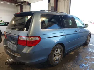 2007 Honda Odyssey EX-L z VIN 5FNRL38617B078923, wystawiony jako IAAI lot #42335122 z przebiegiem 154 352 mil mil oraz . Historia ofert i sprzedaży dostępna na DreamBid. Obrazek 4.