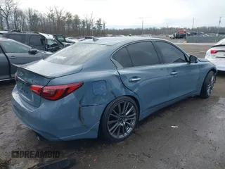 2021 Infiniti Q50 Red Sport 400 with VIN JN1FV7DR0MM880468, listed as a IAAI auction lot 41040172 with 30,715 mi miles and . Bid and sale history available at carsss.com. Image 4.
