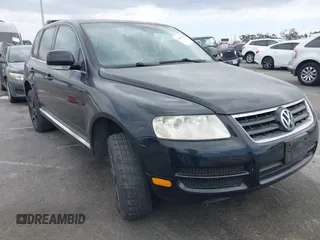 2005 Volkswagen Touareg with VIN WVGZG77L65D067371, listed as a IAAI auction lot 42045951 with 115,618 mi miles and . Bid and sale history available at DreamBid. Image 1.