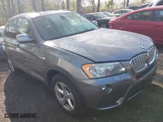 2011 BMW X3 28i with VIN 5UXWX5C55BL708710, listed as a IAAI auction lot 41940504 with 162,240 mi miles. Bid and sale history available at carsss.com. Image 1.