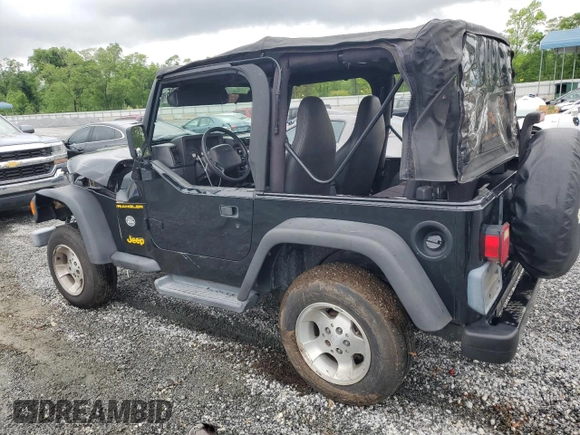 2002 Jeep Wrangler Sport with VIN 1J4FA49S12P730135, listed as a Copart auction lot 54477835 with 148,153 mi miles and Salvage title. Bid and sale history available at DreamBid. Image 2.