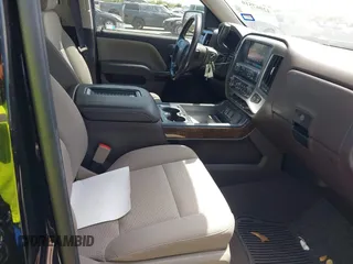 2018 Chevrolet Silverado 1500 LT with VIN 3GCPCREC1JG603937, listed as a IAAI auction lot 42067510 with 81,187 mi miles and . Bid and sale history available at DreamBid. Image 5.