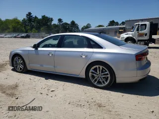 2016 Audi A8 Sport z VIN WAU43AFD7GN005425, wystawiony jako Copart lot #58781405 z przebiegiem 139 435 mil mil oraz Szkoda całkowita • Salvage title. Historia ofert i sprzedaży dostępna na DreamBid. Obrazek 2.