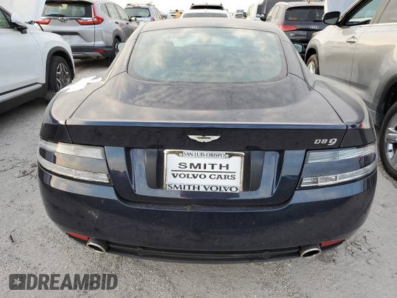 2009 Aston Martin DB9 z VIN SCFAD01E79GA12139, wystawiony jako Copart lot #76241164 z przebiegiem Nie podano mil oraz Szkody całkowita. Historia ofert i sprzedaży dostępna na DreamBid. Obrazek 6.