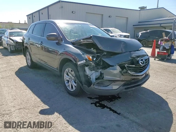 2015 Mazda CX-9 Sport with VIN JM3TB2BV7F0469064, listed as a Copart auction lot 74280004 with 140,270 mi miles and Salvage title. Bid and sale history available at DreamBid. Image 12.