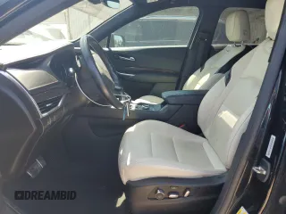 2021 Cadillac XT4 FWD Sport with VIN 1GYFZER44MF015908, listed as a Copart auction lot 52214925 with 94,079 mi miles and Clean Title. Bid and sale history available at carsss.com. Image 7.
