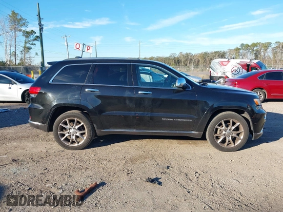 2014 Jeep Grand Cherokee Summit with VIN 1C4RJEJG1EC130727, listed as a IAAI auction lot 41269066 with 205,914 mi miles and . Bid and sale history available at DreamBid. Image 13.
