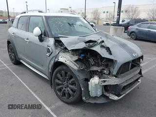 2017 MINI Countryman Cooper S z VIN WMZYT5C32H3D81134, wystawiony jako IAAI lot #41657628 z przebiegiem 131 700 mil mil oraz . Historia ofert i sprzedaży dostępna na DreamBid. Obrazek 1.