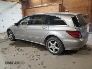 2007 Mercedes-Benz R 3.5L with VIN 4JGCB65E67A056426, listed as a Copart auction lot 77419504 with 169,520 mi miles and Salvage Title. Bid and sale history available at DreamBid. Image 2.