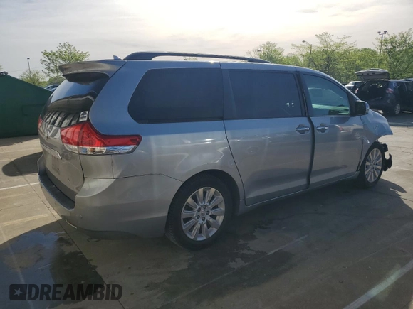 2013 Toyota Sienna XLE AAS with VIN 5TDYK3DC1DS318277, listed as a Copart auction lot 54156935 with 218,564 mi miles and Salvage title. Bid and sale history available at DreamBid. Image 3.