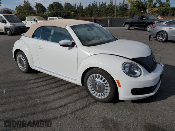 2015 Volkswagen Beetle 1.8T with VIN 3VW517AT6FM802771, listed as a Copart auction lot 72225834 with 128,946 mi miles and Salvage title. Bid and sale history available at DreamBid. Image 4.