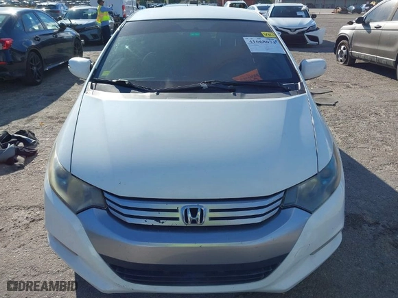 2011 Honda Insight EX with VIN JHMZE2H73BS009609, listed as a IAAI auction lot 41668074 with 252,432 mi miles. Bid and sale history available at carsss.com. Image 12.