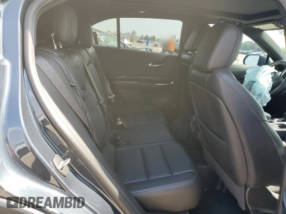 2020 Cadillac XT4 FWD Sport with VIN 1GYFZER40LF012664, listed as a Copart auction lot 54797915 with 59,393 mi miles and Salvage title. Bid and sale history available at DreamBid. Image 11.