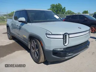 2022 Rivian R1T Adventure Package with VIN 7FCTGAAA2NN006053, listed as a IAAI auction lot 41974199 with 286 mi miles. Bid and sale history available at carsss.com. Image 1.