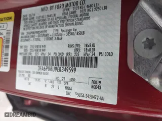 2014 Ford Fusion Titanium Hybrid with VIN 3FA6P0RU9ER349599, listed as a IAAI auction lot 41928864 with 94,312 mi miles. Bid and sale history available at carsss.com. Image 9.