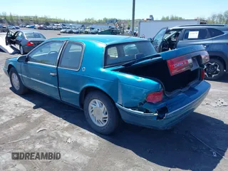 1992 Mercury Cougar z VIN 1MEPM6043NH646925, wystawiony jako IAAI lot #42128701 z przebiegiem 37 103 mil mil oraz . Historia ofert i sprzedaży dostępna na DreamBid. Obrazek 3.