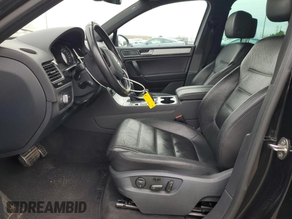 2017 Volkswagen Touareg Wolfsburg Edition with VIN WVGRF7BP9HD006520, listed as a Copart auction lot 84168634 with 76,596 mi miles and Salvage title. Bid and sale history available at DreamBid. Image 7.