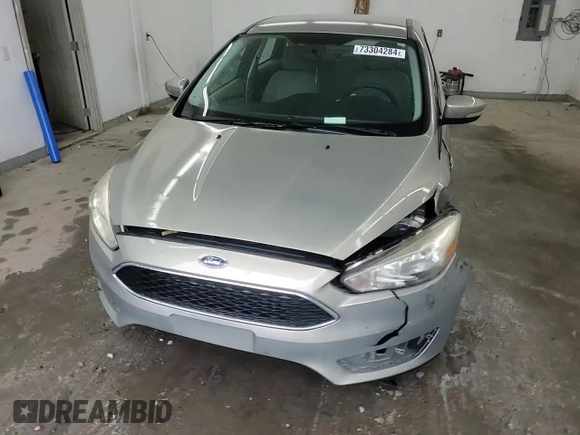 2016 Ford Focus SE with VIN 1FADP3F2XGL355148, listed as a Copart auction lot 73304284 with 166,785 mi miles and Salvage Title. Bid and sale history available at carsss.com. Image 11.