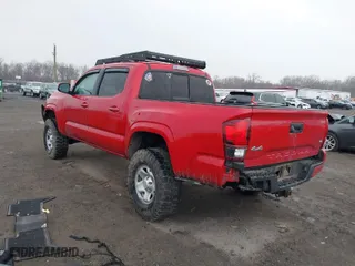 2019 Toyota Tacoma 4WD SR with VIN 3TMCZ5AN0KM202251, listed as a IAAI auction lot 41676243 with 116,911 mi miles. Bid and sale history available at carsss.com. Image 3.