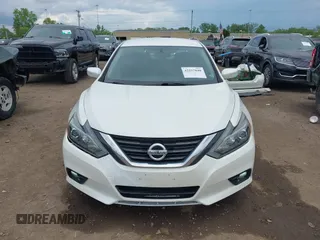 2016 Nissan Altima S z VIN 1N4AL3AP0GC174433, wystawiony jako IAAI lot #42257840 z przebiegiem 122 158 mil mil oraz . Historia ofert i sprzedaży dostępna na DreamBid. Obrazek 13.