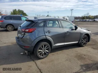 2016 Mazda CX-3 Grand Touring with VIN JM1DKBD72G0108273, listed as a Copart auction lot 52844755 with 138,552 mi miles and Salvage Title. Bid and sale history available at carsss.com. Image 3.