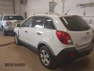 2014 Chevrolet Captiva Sport LS with VIN 3GNAL2EK9ES648395, listed as a IAAI auction lot 42261664 with 128,360 mi miles and . Bid and sale history available at DreamBid. Image 3.