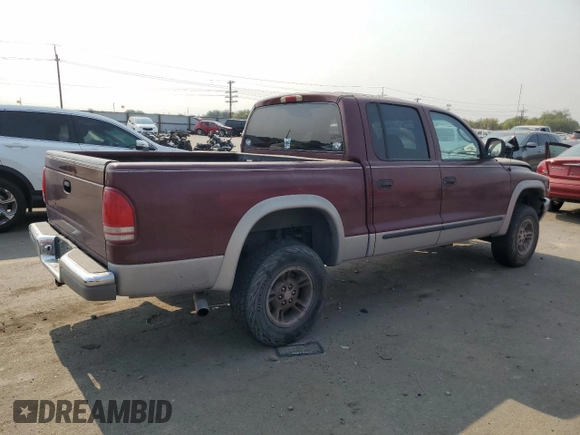 2000 Dodge Dakota Sport with VIN 1B7GG2AN1YS699073, listed as a Copart auction lot 70782284 with 141,876 mi miles and Salvage Title. Bid and sale history available at carsss.com. Image 3.