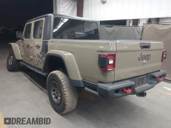 2020 Jeep Gladiator Rubicon z VIN 1C6JJTBGXLL178893, wystawiony jako IAAI lot #42206863 z przebiegiem 29 138 mil mil oraz . Historia ofert i sprzedaży dostępna na DreamBid. Obrazek 3.