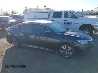 2017 Honda Civic Sedan EX-L with VIN 19XFC1F75HE022400, listed as a IAAI auction lot 41677489 with 157,237 mi miles. Bid and sale history available at carsss.com. Image 13.
